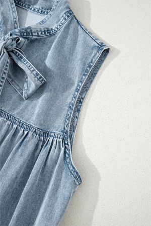 Sleeveless Cotton Chambray Dress with Ruffle Hem and Bow Tie Neck