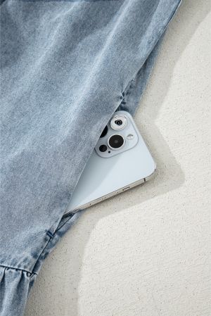 Sleeveless Cotton Chambray Dress with Ruffle Hem and Bow Tie Neck