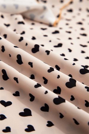 Women’s Short Beige Dress with Heart Print and Ruffle Sleeves