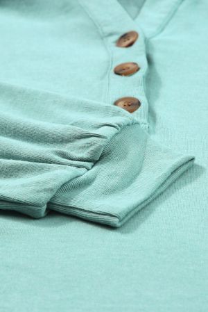 Women’s Hoodie with Buttons and Asymmetrical Hem