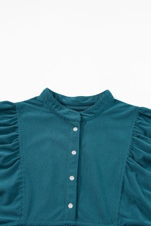 Дамска рокля от синьо кадифе с буфан ръкави и копчета