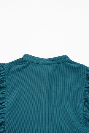 Дамска рокля от синьо кадифе с буфан ръкави и копчета