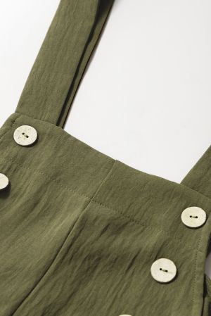 Дълъг дамски гащеризон в зелено с ефектни копчета и прав крачол