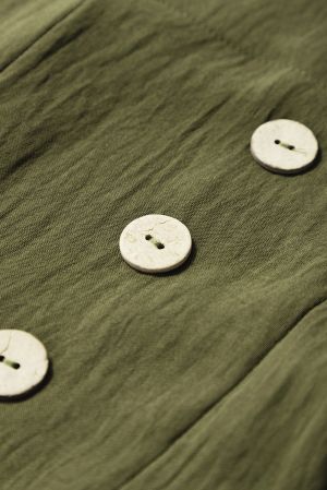 Дълъг дамски гащеризон в зелено с ефектни копчета и прав крачол