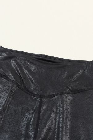 Women's Black Faux Leather Leggings with Crossed Dip Waist