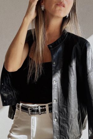 Дамско черно яке от еко кожа с копчета и свободна кройка