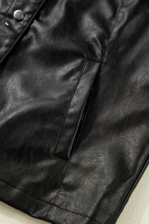 Дамско черно яке от еко кожа с копчета и свободна кройка