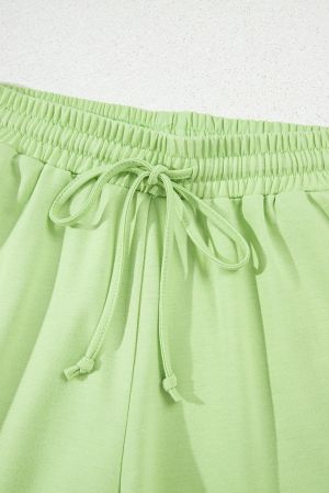 Meadow Mist Green Solid Loose V Neck Half Sleeve Tee and Shorts