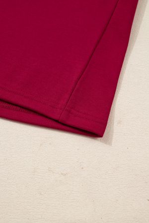 Дамска рокля в цвят бордо с джобове и ефектни панделки по ръкавите