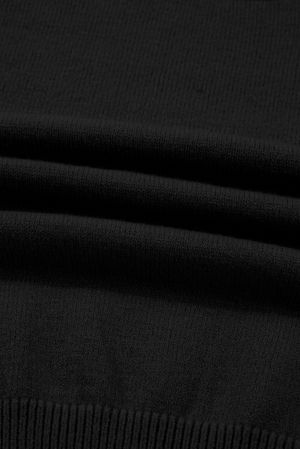 Дамски черен плетен комплект - пуловер с висока яка и мини пола