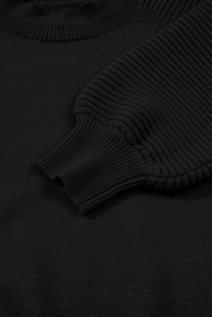 Дамски черен плетен комплект - пуловер с висока яка и мини пола