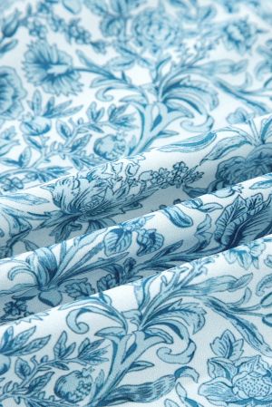 Дамска светлосиня риза с флорален принт и обемни ръкави