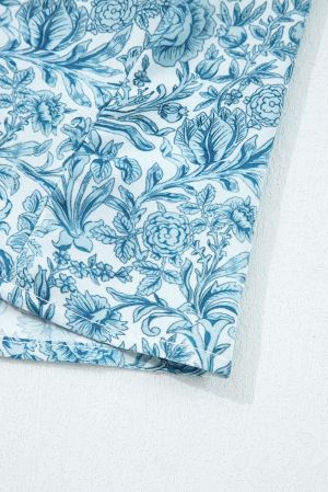 Дамска светлосиня риза с флорален принт и обемни ръкави